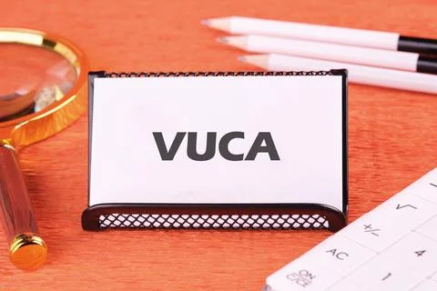 Volatility Uncertainty Complexity Ambiguity. VUCA text on a white business ca 库存照片