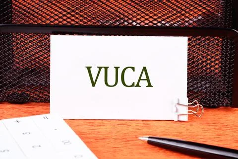 Volatility Uncertainty Complexity Ambiguity. VUCA text on a white business ca Stockfoto's