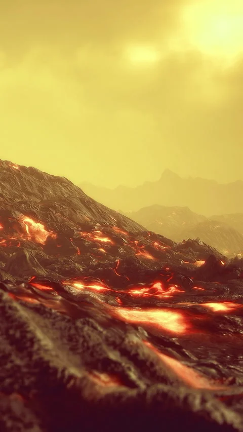 Volcanic activity with flowing lava under a yellow sky in an alien landscape Stock Footage 335309488