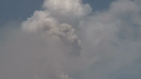 Volcanic Ash Rise Into Air From Top Of Erupting Volcano Stock Footage