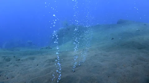 Volcanic Bubble Escaping Through Sand Stock Footage 64379800