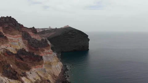 Volcanic Cliffs and Deep Blue Sea in Santorini, Greece Stock Footage 312122099