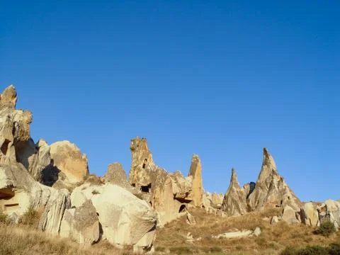 Volcanic cliffs and rock formations at Cappadocia Photos