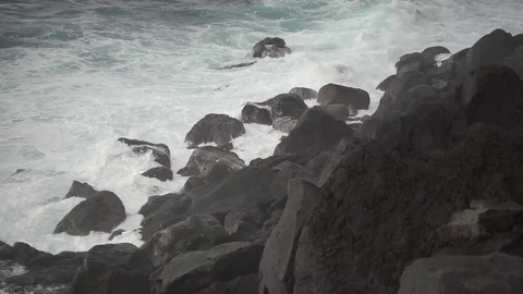 Volcanic coastline and waves breaking, super slow motion Stock Footage 73364003