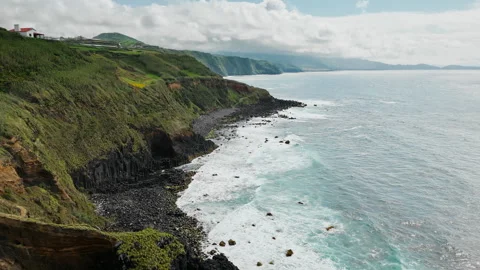 Volcanic coastline with basalt cliffs and Atlantic waves on Azores Stock Footage 340067859