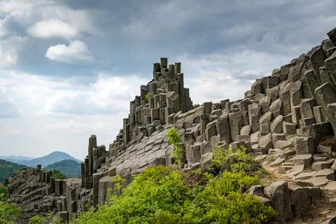 Volcanic column formation of panská skála in czech republic Stock Photos