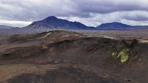 Volcanic Crater and Mountain Range Aerial View Stock Footage 324035136