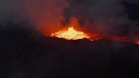 Volcanic Eruption Aerial View Featuring Molten Lava Flowing Down the Mountain Stockbeeldmateriaal 331044406