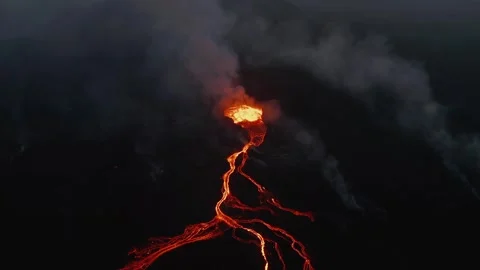 Volcanic Eruption Aerial View Featuring Glowing Lava Flowing Down the Mountain 库存影片 331044512