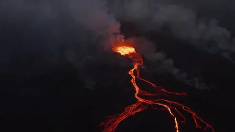 Volcanic Eruption Aerial View Featuring Glowing Molten Lava Flowing Downhill 库存影片 331044532