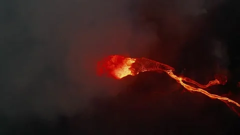 Volcanic Eruption Aerial View Featuring Glowing Molten Lava Flowing over Land 库存影片 331044819