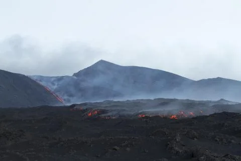 Volcanic eruption at dawn Stock Photos
