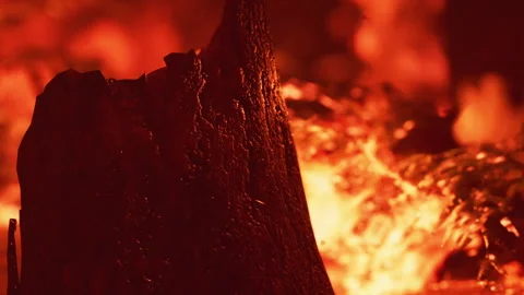 Volcanic eruption display with lava and rock formations at nighttime Stock Footage 338321307