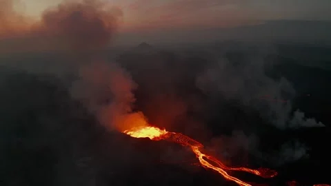 Volcanic Eruption Flowing Red Lava Under Dark Clouds Aerial View 库存影片 331044830