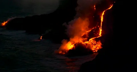 Volcanic Eruption Lava flowing into the water Hawaii Stock Footage 66494563