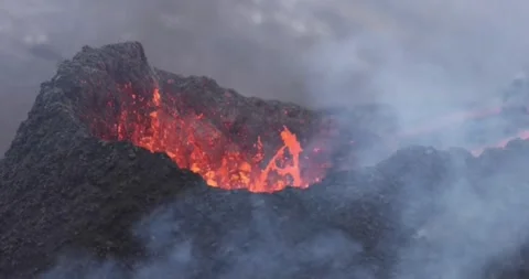 Volcanic eruption red hot lava closeup eruption volcano mountain Stock Footage 336580006