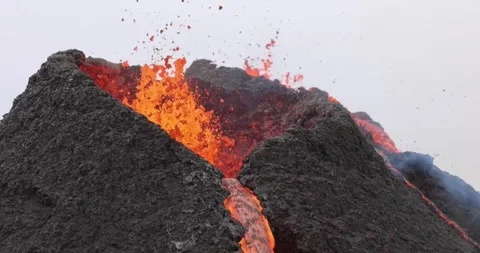 Volcanic eruption red hot lava closeup eruption volcano mountain Stock Footage 336580096