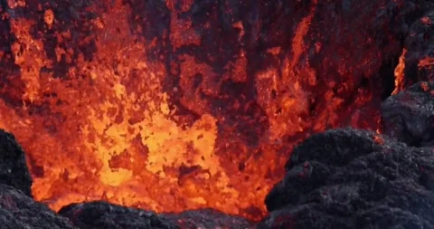 Volcanic eruption red hot lava closeup eruption volcano mountain Stock Footage 336580124