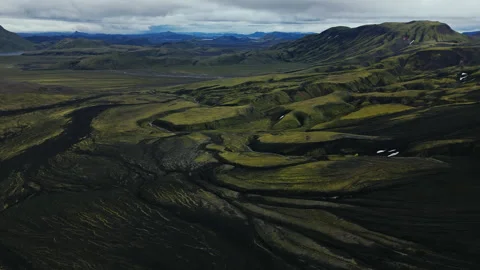 Volcanic Highlands with Black Lava Fields and Green Moss Iceland Aerial Stock Footage 318931292