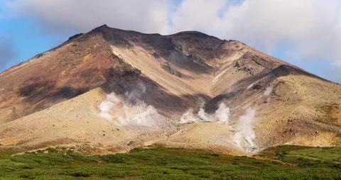 Volcanic landscape of Mount Asahi-dake in early autumn, Japan. Stock Photos