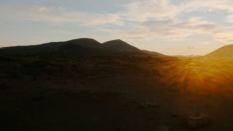 Volcanic Landscape Sunset Flare Stock Footage 101944033