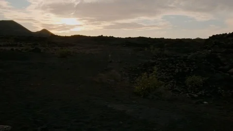 Volcanic landscape sunset pan Stock Footage 101795844