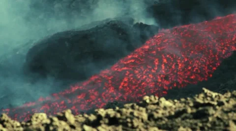 Volcanic lava flowing in channel Stock Footage 53294580