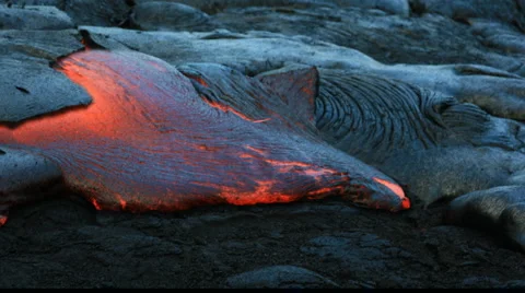 Volcanic lava vent spewing molten rock from a fissure. Stock Footage 4885264