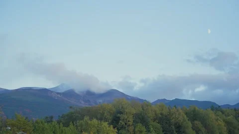 Volcanic mountain range with moving clouds in Hokkaido Japan 動画素材 344580553