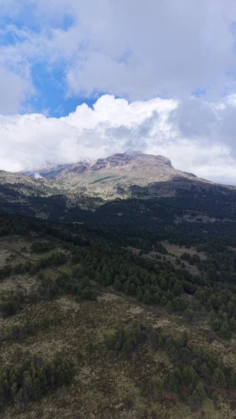 Volcanic mountain ridge in clouds, drone aerial, central Mexico Stock Footage 348234975