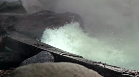 Volcanic pool water boiling and bubbling hot springs steam rising Stock Footage 62007323