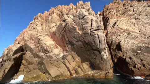 Volcanic rock formations of calanques de piana in corsica seen from boat Stock Footage 279442352