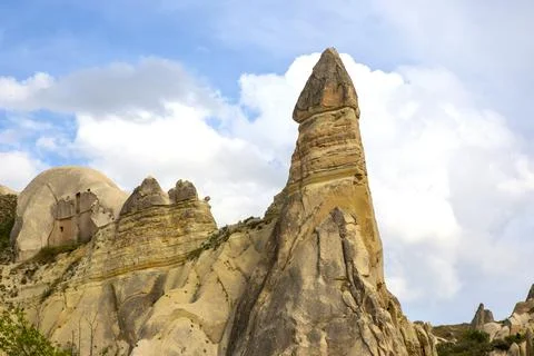 Volcanic rocks and limestone cliffs in Cappadocia valley. Turkey. Tourism and Stock Photos