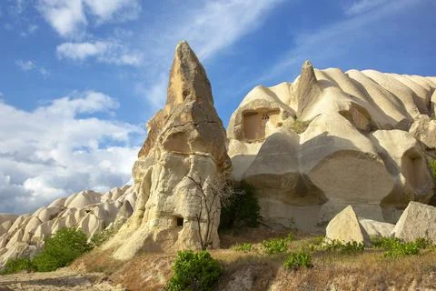 Volcanic rocks and limestone cliffs in Cappadocia valley. Turkey. Tourism and Stock Photos