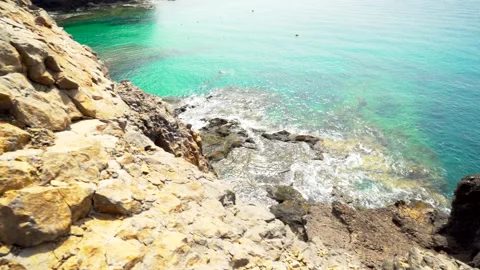 Volcanic rocks with ocean spray Stock Footage 318800174