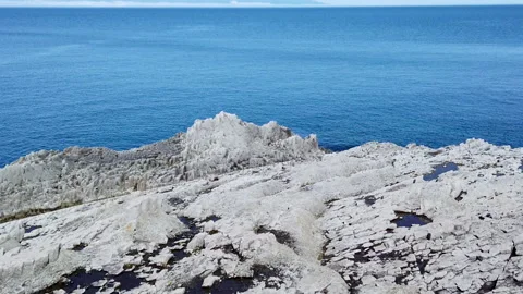 Volcanic rocks with sea view Stockbeeldmateriaal 155965822