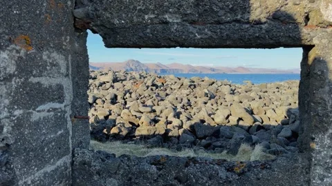 Volcanic Rocks Seen Through The Window Of An Abandoned Building In Hopsnes Stock Footage 337910480