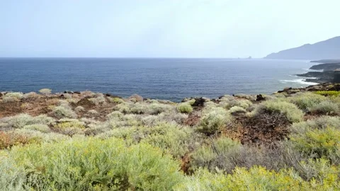 Volcanic shore and landscape of El Hierro island in front of the Atlantic Ocean Stock Footage 175303680