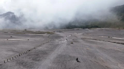 Volcanic Smoke and Ash Over Mount Bromo Sand Plain Indonesia Video stock 344893045