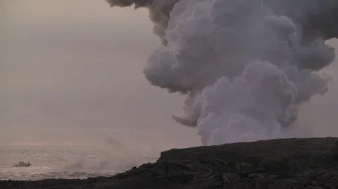 Volcanic Steam Cloud Rises From Behind Cooled Molten Lava Coast Line 2 動画素材 19288671