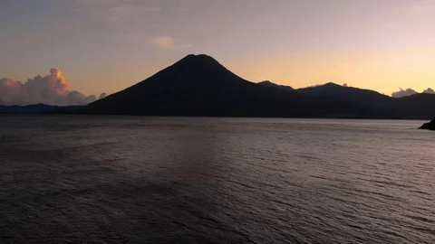 Volcanic Sunset Over Lake Stock Footage 122846202