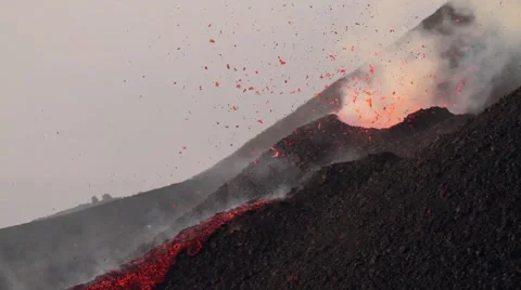 Volcano activity at dawn with beautiful explosion Stock Footage 53847059