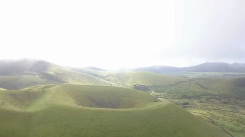 Volcano aerial view from the clouds - shot with drone in Azores Stock Footage 90776159