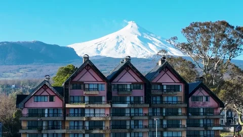 Volcano Behind Building At Pucon In Los Rios Chile. Stock Footage 310012160