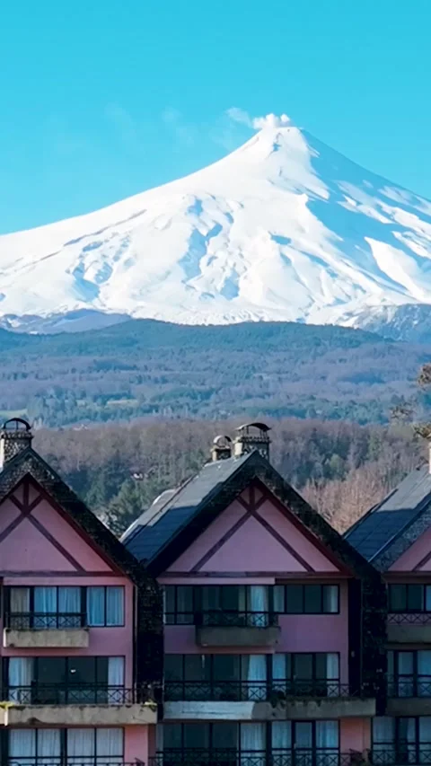 Volcano Behind Building At Pucon In Los Rios Chile. Stock Footage 327537407