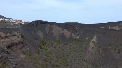 Volcano black sand and crater landscape tilt down volcano Teneguia at La Palma Stock Footage 108658932