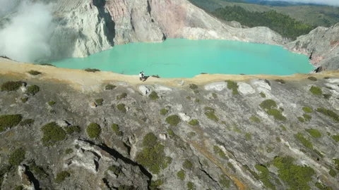 Volcano Caldera Kawah Ijen Java Indonesia Drone Rise Reveal 4K 30FPS Stock Footage 327798477