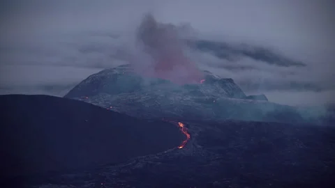Volcano cone glowing in mist at dusk Iceland 2021 스톡 동영상 156719563
