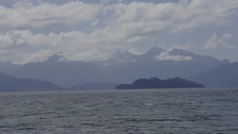 Volcano covered by clouds against blue sky Stock Footage 308578596