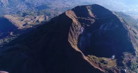 Volcano crater with smoke along the edge Stock Footage 114592053